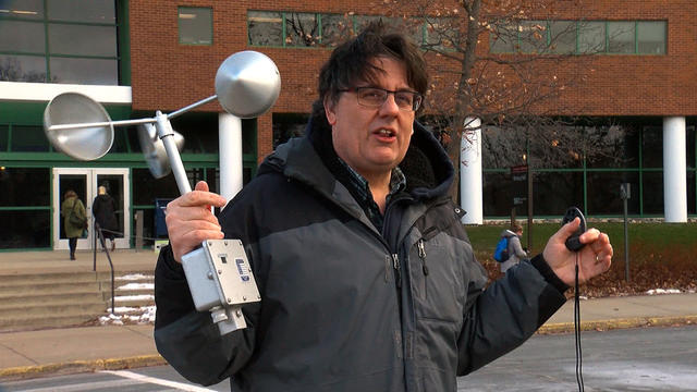assistant-state-climatologist-pete-boulay-holds-an-anemometer-to-measure-wind-speed.jpg 