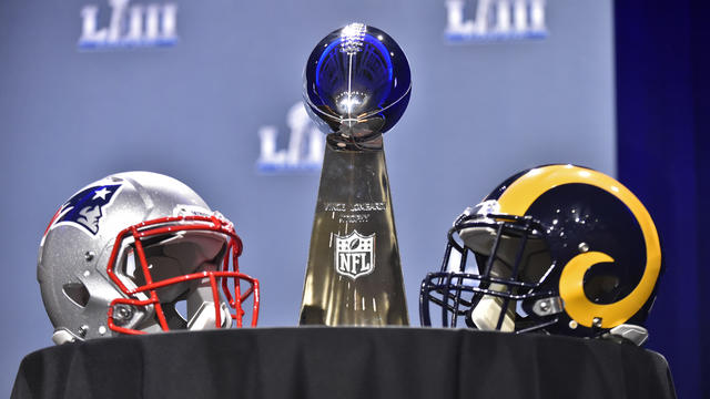 Super Bowl LIII - Rams Patriots helmets and trophy 