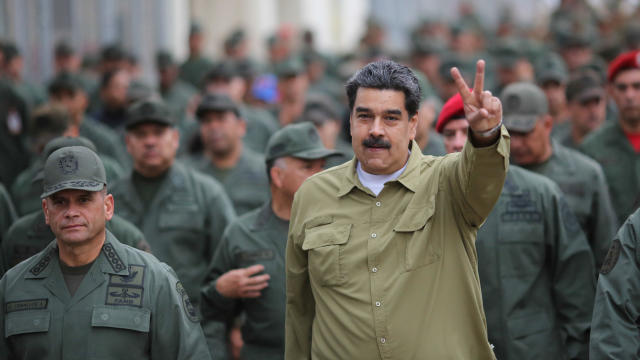 Venezuela's President Nicolas Maduro gestures during a meeting with soldiers at a military base in Caracas 