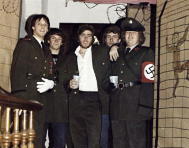 In this photo from the 1980 edition of Spectrum, the Gettysburg College yearbook, Bob Garthwait, right, wears a costume that depicts a Nazi uniform at a fraternity event. 