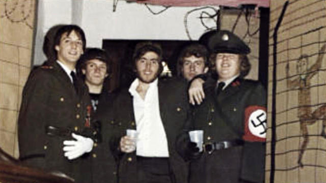 In this photo from the 1980 edition of Spectrum, the Gettysburg College yearbook, Bob Garthwait, right, wears a costume that depicts a Nazi uniform at a fraternity event. 