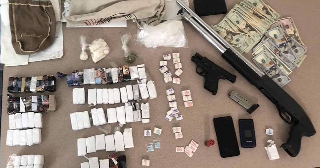 Police: More Than 4,000 Bags Of Heroin, Guns Seized During Raid - CBS ...