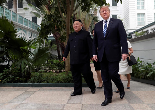 North Korean leader Kim Jong Un and U.S. President Donald Trump walk in the garden of the Metropole hotel during the second North Korea-U.S. summit in Hanoi, Vietnam 
