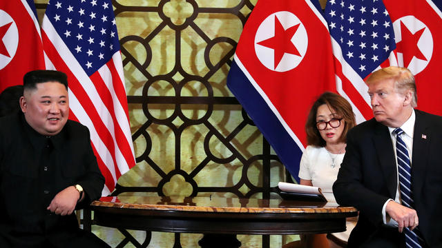 U.S. President Donald Trump looks towards North Korean leader Kim Jong Un during the one-on-one bilateral meeting at the second North Korea-U.S. summit in Hanoi 