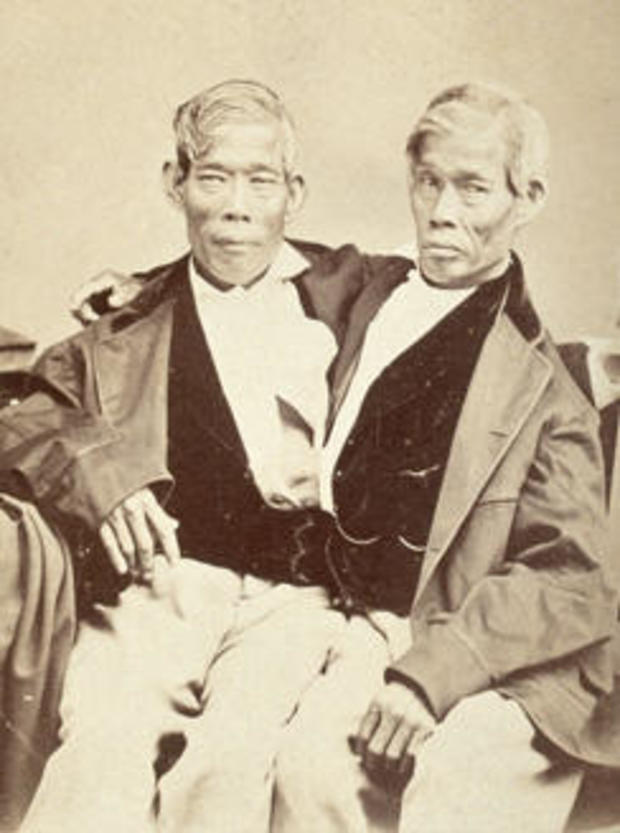 V0029573 Chang and Eng, conjoined twins, seated. P 