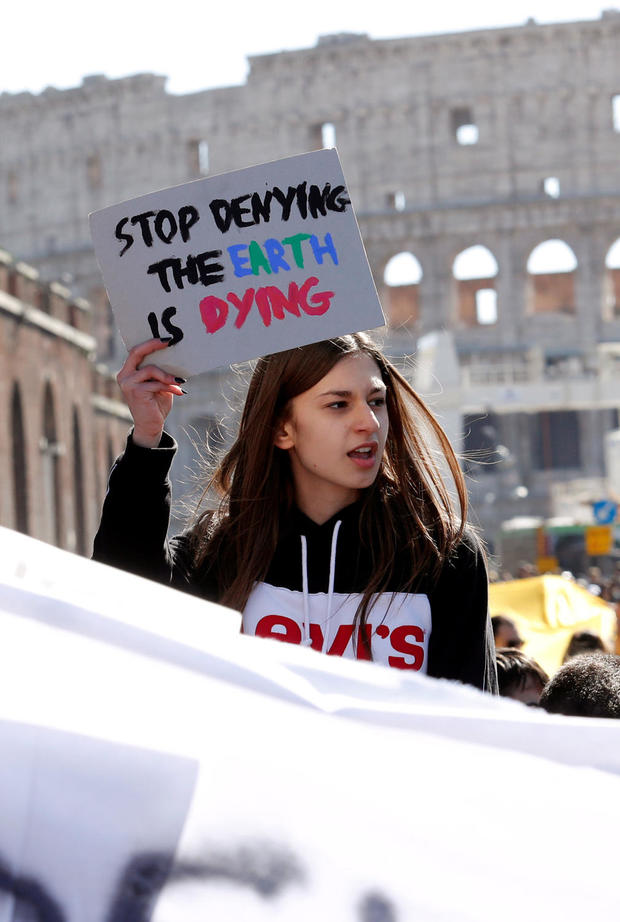Italian students gather near the Colosseum to call for action on climate change, in Rome 
