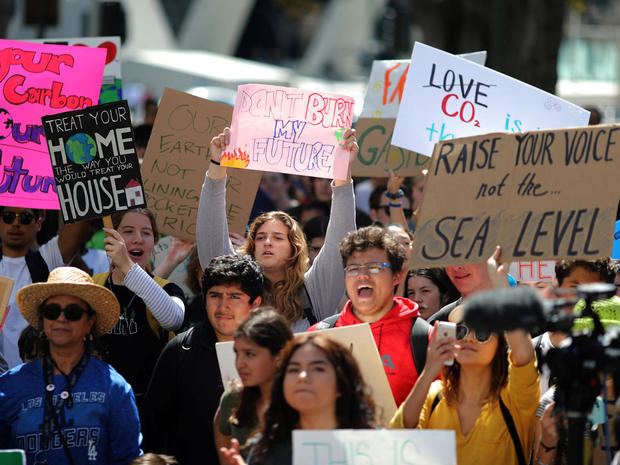 Students attend a protest rally to call for urgent action to slow the pace of climate change, in Los Angeles 