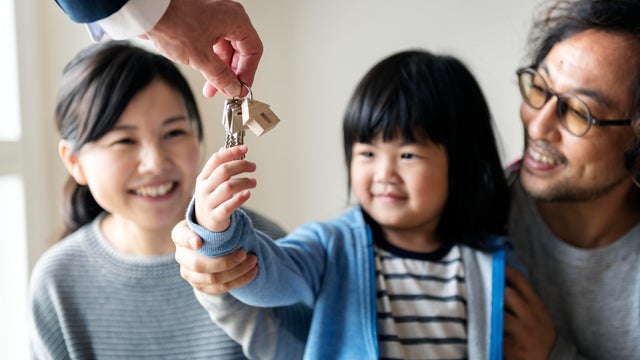 Asian family buy new house 