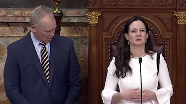 Republican Pennsylvania state Rep. Stephanie Borowicz delivers the opening prayer in the state House of Representatives as Republican House Speaker Mike Turzai looks on March 25, 2019. 