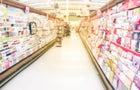 Panoramic blurry background variety of greeting cards on display at American supermarket 