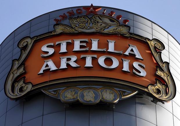 FILE PHOTO: The logo of beer brand Stella Artois, part of the Anheuser-Busch InBev group, is pictured outside the brewer's headquarters in Leuven 