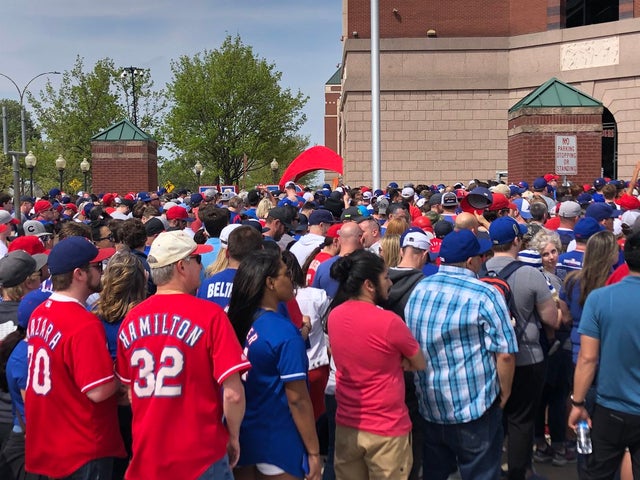 Rangers fans wait in line to get into Globe Life Park 