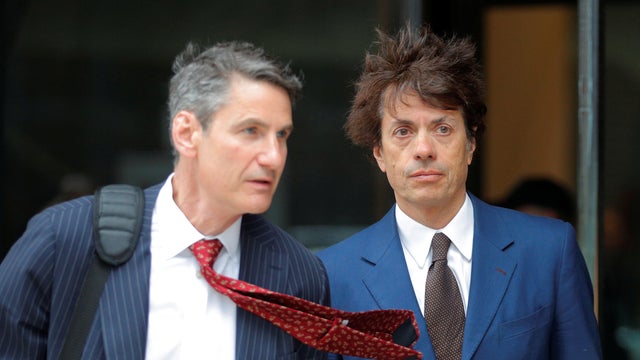 Agustin Huneeus Jr. leaves the federal courthouse in Boston 