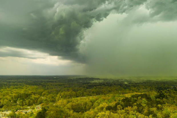An aerial view shows storm clouds pushing pollen over an area in Durham, North Carolina 