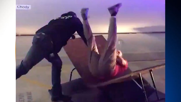 Pro wrestler Dustin Rhodes body slams Williamson Deputy Hernandez 