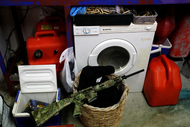 Noel Womersley's AR-15 semi-automatic rifle is seen in the garage of his house outside Christchurch 