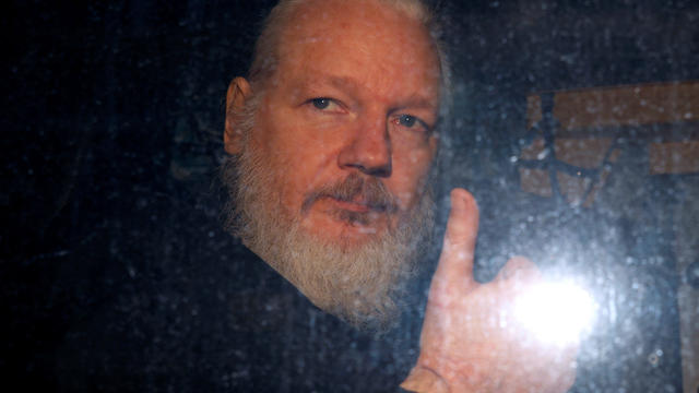WikiLeaks founder Julian Assange is seen as he leaves a police station in London 