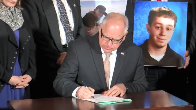 tim-walz-signing-hands-free-bill.jpg 