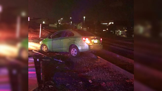 car-drives-on-railroad-tracks-.jpg 
