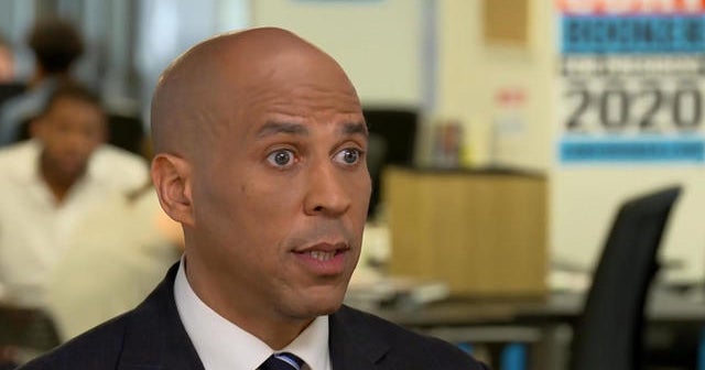 Booker details proposals on health care and immigration