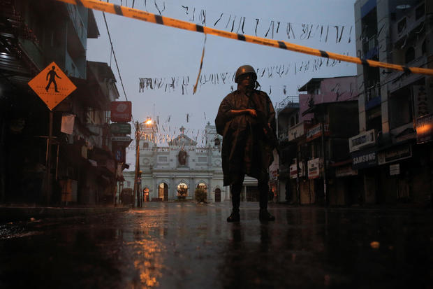 A soldier stands guard at St. Anthony's Shrine, days after a string of suicide bomb attacks on churches and luxury hotels across the island on Easter Sunday, in Colombo 