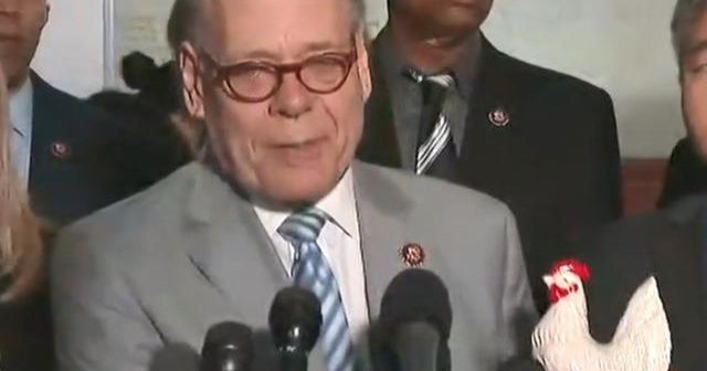 Rep. Steve Cohen holds up chicken statuette, calls attorney general