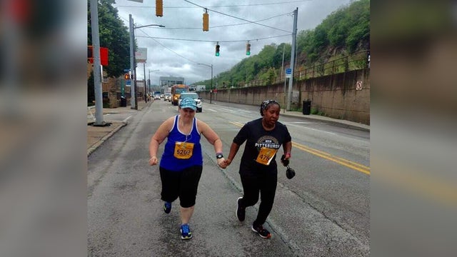 marathon-hand-hold.jpg 
