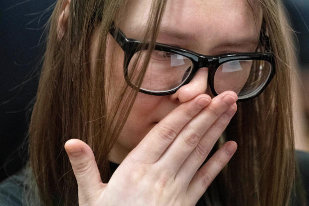Anna Sorokin, who a New York jury convicted of swindling more than $200,000 from banks and people, reacts during her sentencing in the Manhattan borough of New York May 9, 2019. 