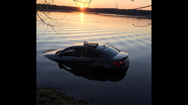 car into lake avon 