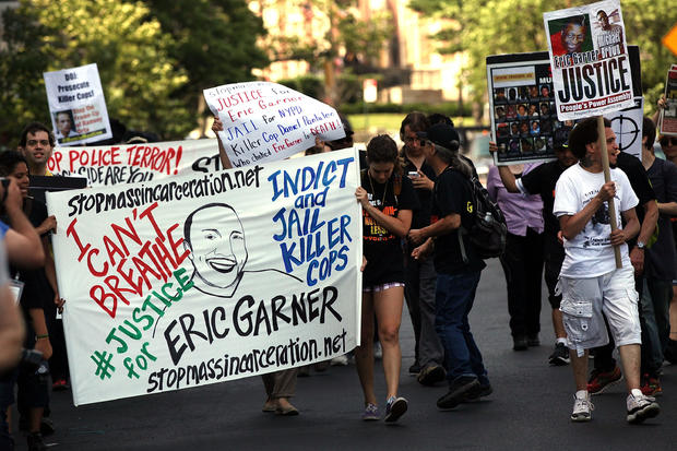 Protestors Rally Against Police Violence 1 Year After Eric Garner's Death 