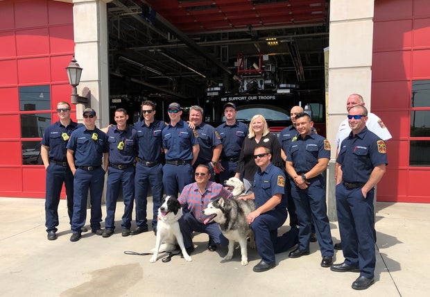 Dogs, owner reunited with McKinney Fire Dept. rescue team 