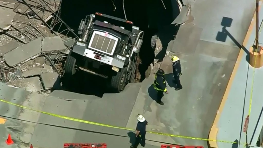 Truck Falls Through Parking Garage In North Bergen 