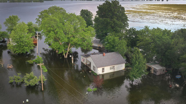 Midwest Rivers Reach Major Flood Stage At Historic Levels 