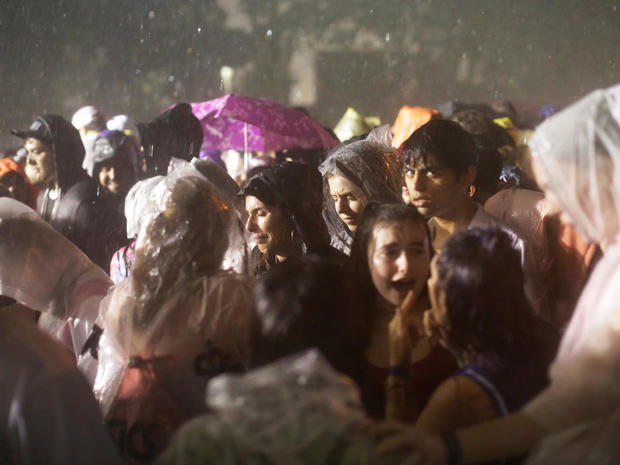 Attendees evacuate the festival grounds due to severe weather during the Governors Ball Music Festival at Randall's Island Park in New York 