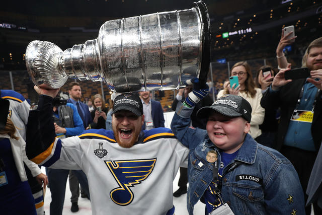 Colton Parayko raises Stanley Cup with Laila Anderson during Blues  championship celebration