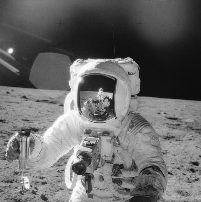 astronauts on the moon shooting guns