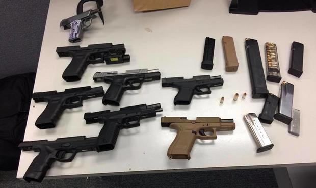 Guns seized by Arlington Police after pawn shop robbery 