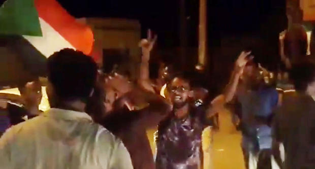 People celebrate in Omdurman 
