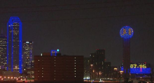 Downtown Dallas lit up blue in honor of police officers 