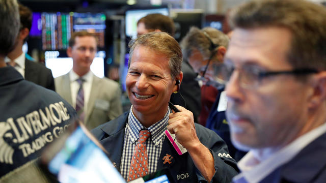 Traders work on the floor of the New York Stock Exchange shortly after the opening bell in New York 