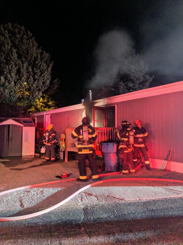 dog saves owner from mobile home fire 3 - berthoud fire 