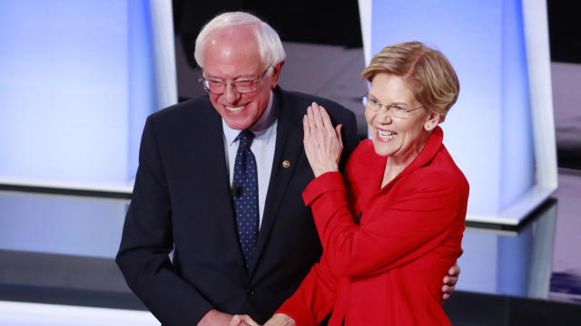 U.S. Senators Sanders and Warren shake hands before the start of the first night of the second 2020 Democratic U.S. presidential debate in Detroit, Michigan, U.S. 