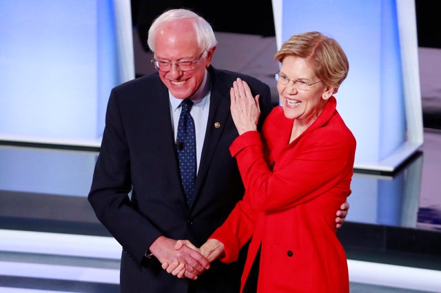U.S. Senators Sanders and Warren shake hands before the start of the first night of the second 2020 Democratic U.S. presidential debate in Detroit, Michigan, U.S.