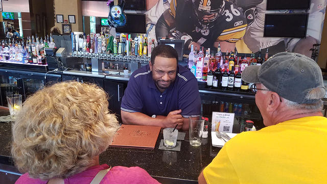 Jerome-Bettis-At-Bar-With-Customers.jpg 