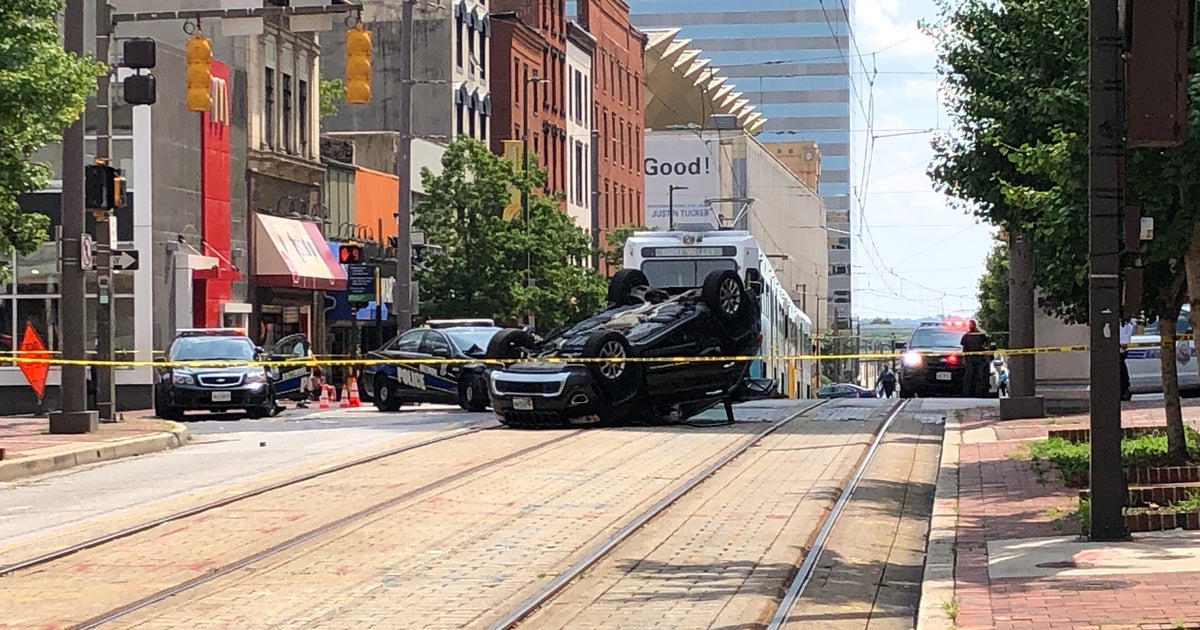 Baltimore Police Officer Crashes Into Car While Responding To Bank ...