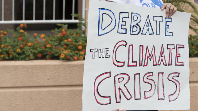 Greenpeace Protests Outside DNC Headquarters Urging The Party To Hold A Climate Change Debate 