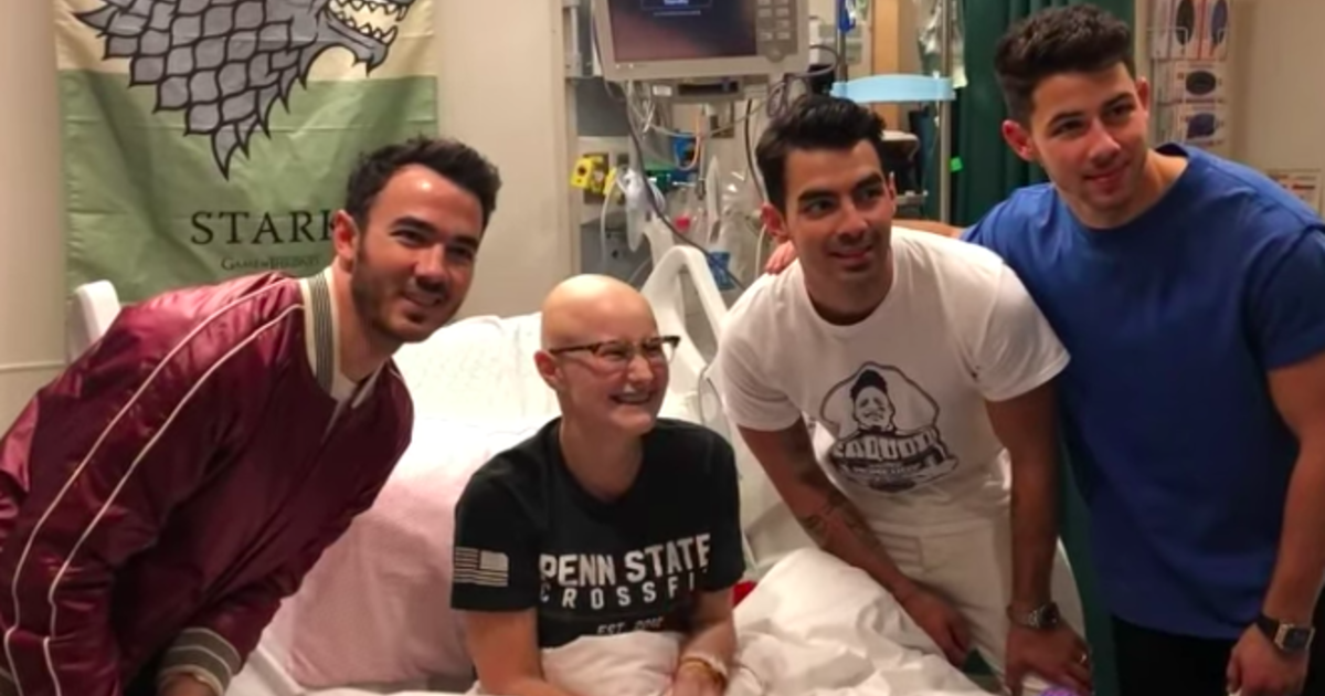 Jonas Brothers surprise fan at hospital after she had to miss concert for chemotherapy treatment