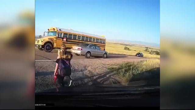DRIVER-IGNORES-SCHOOL-BUS-5VOTZ.transfer_frame_51.jpg 