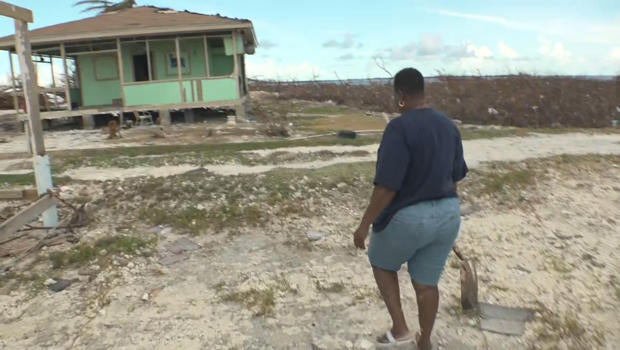 bahamas-eva-thomas-outside-her-home-with-shovel-620.jpg 