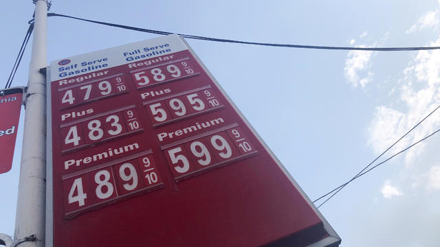 FILE PHOTO: A sign displaying gas prices is seen in Los Angeles 